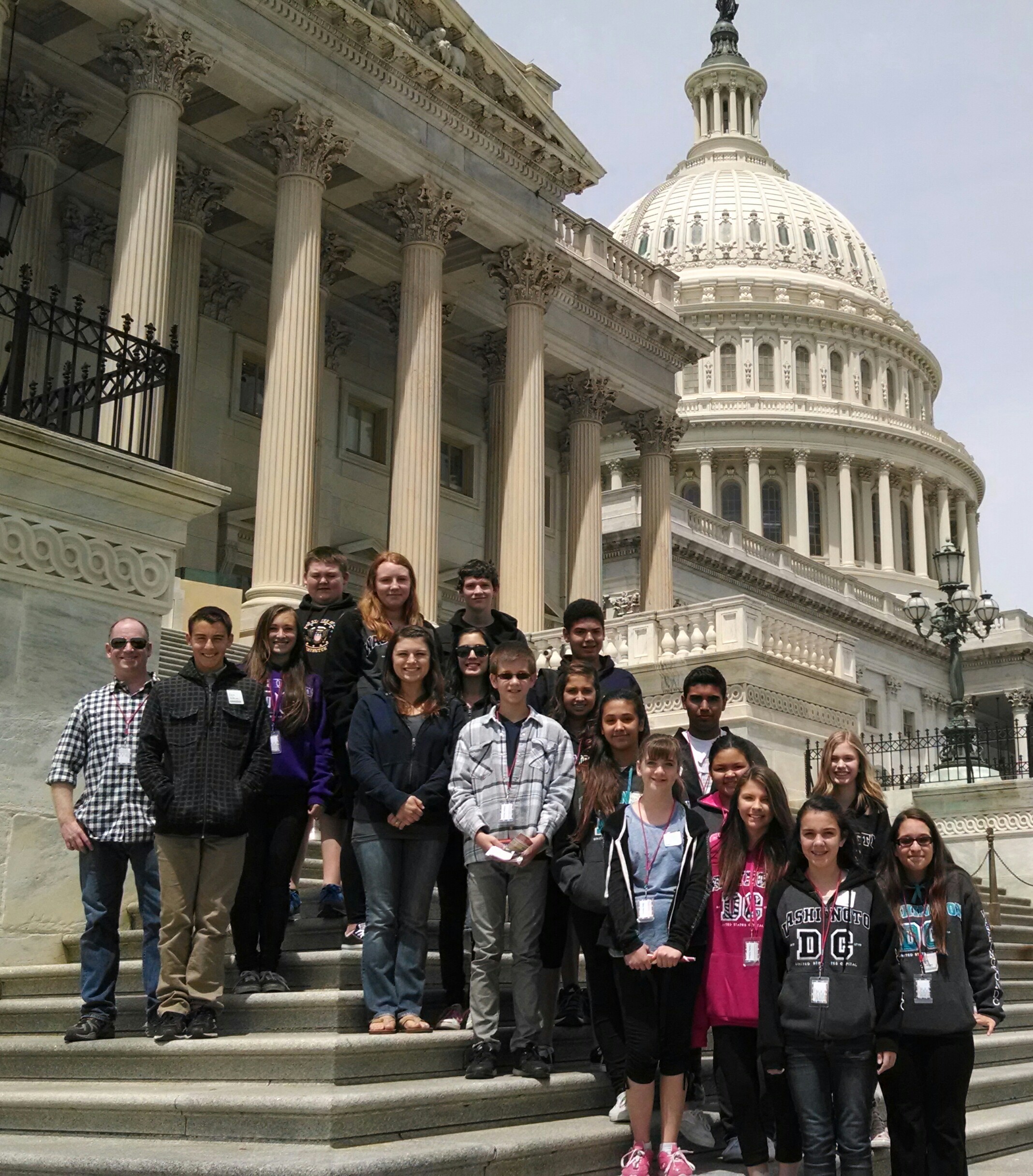 Group of middle school students standing in front of the Capitol Building in Washington DC