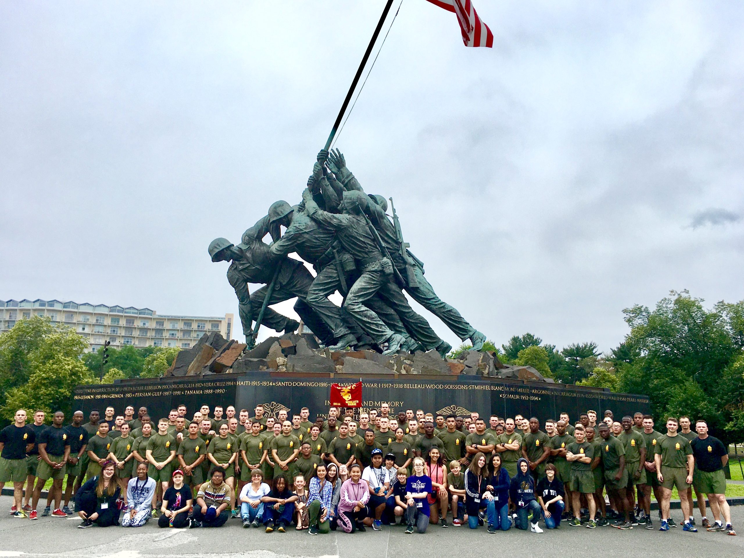 group of young students and SMC Sgt Major School people at Iwo Jima Memorial