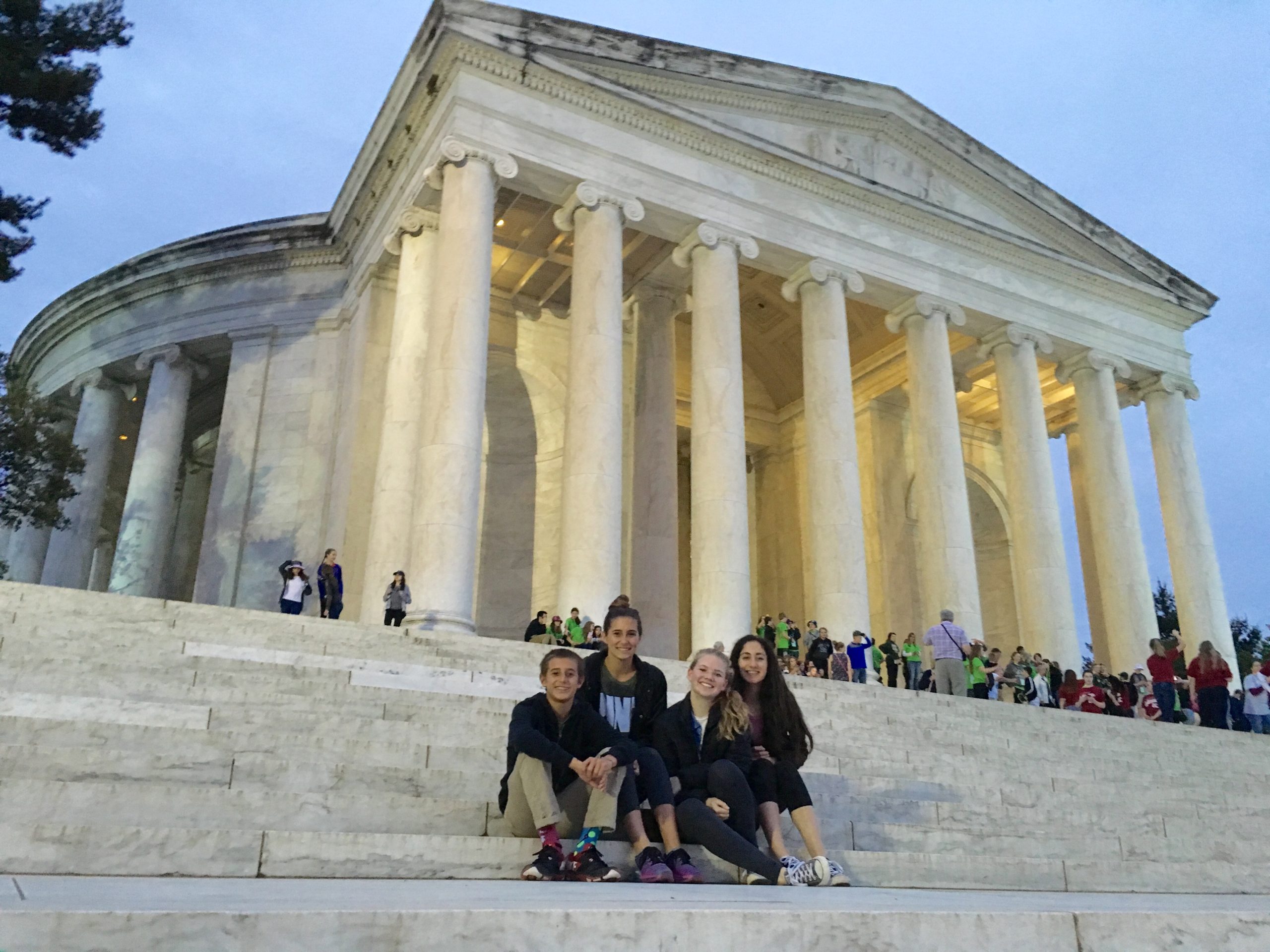 Students posing on steps at Jefferson Memorial in Washington DC