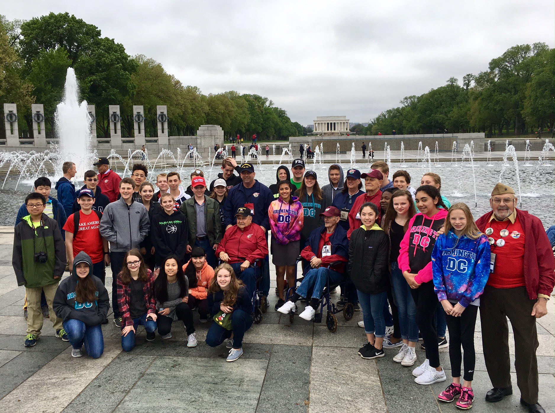 group of students posing at WWI memorial in Washington DC