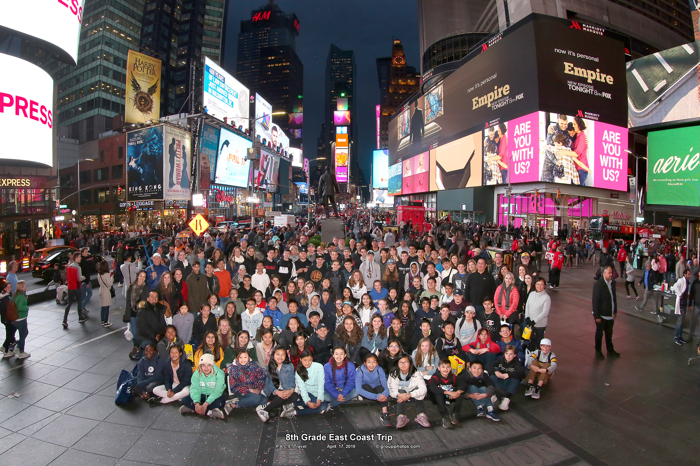 Group of students posing for an image at Times Square in New York City