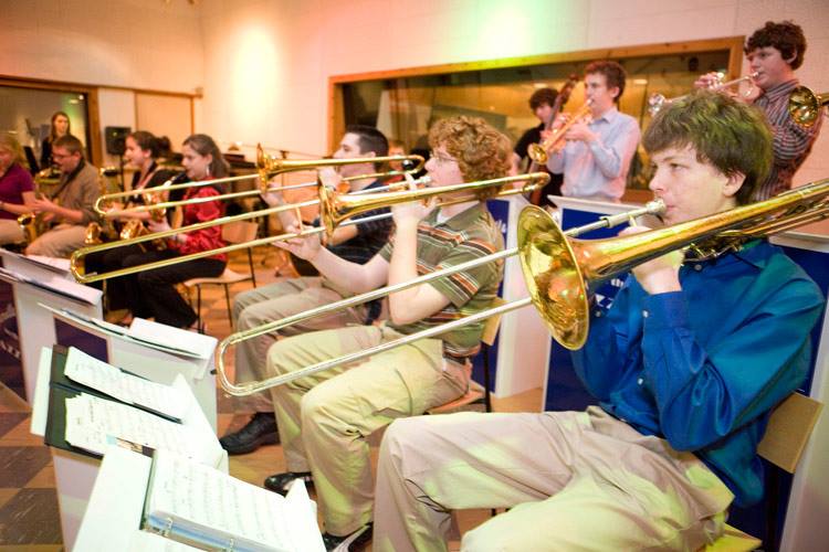 Student band practicing in a studio room